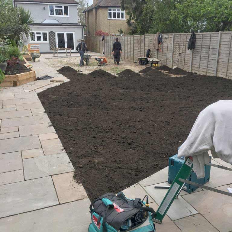 Moving in soil for law turfing. New Patio, Turfing & Garden Landscaping, Croydon