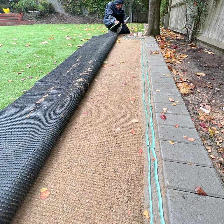 Artificial Grass & Garden Landscaping, steps and retaining wall, Banstead, Surrey. All Terrain Landscaping, Morden