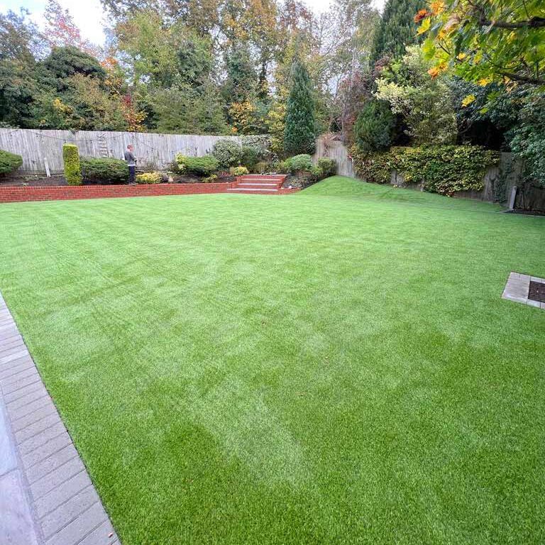 Artificial Grass & Garden Landscaping, steps and retaining wall, Banstead, Surrey. All Terrain Landscaping, Morden