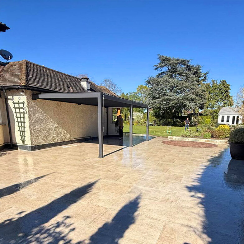 Porcelain and Clay Paver Patio with Metal Pergola, Cheam Village, Sutton. All Terrain Landscaping