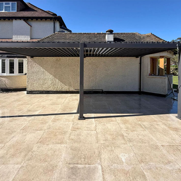 Porcelain and Clay Paver Patio with Metal Pergola, Cheam Village, Sutton. All Terrain Landscaping