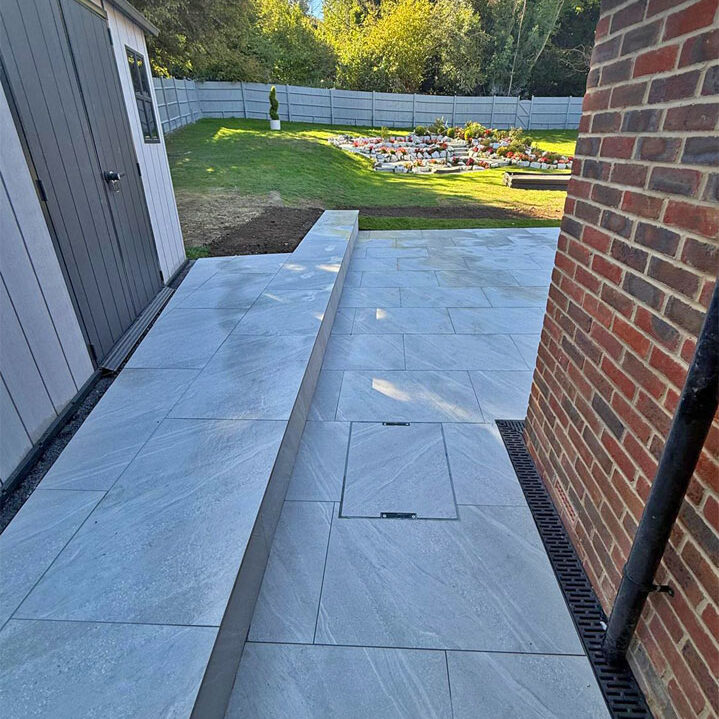 Porcelain Patio, Raised Patio and Steps, Epsom. All Terrain Landscaping