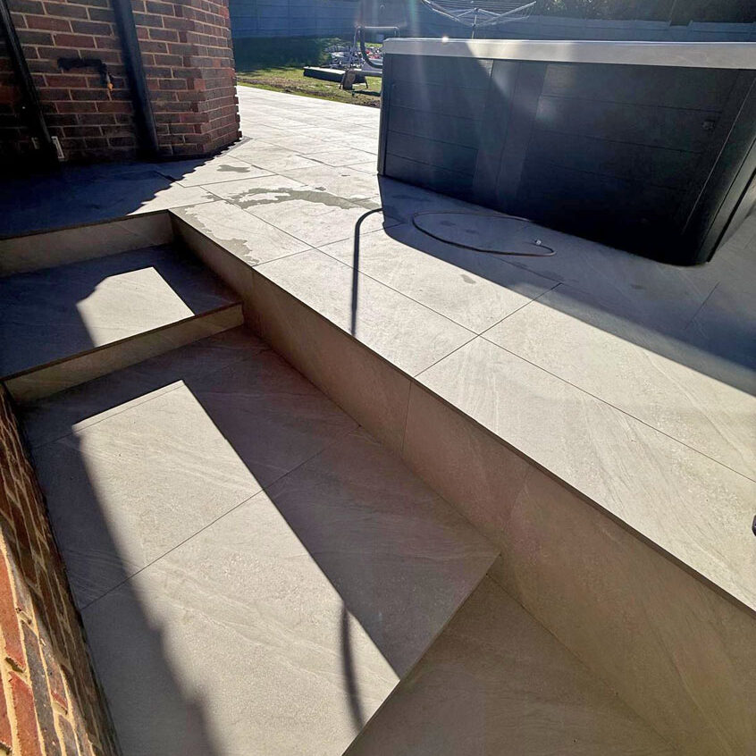 Porcelain Patio, Raised Patio and Steps, Epsom. All Terrain Landscaping